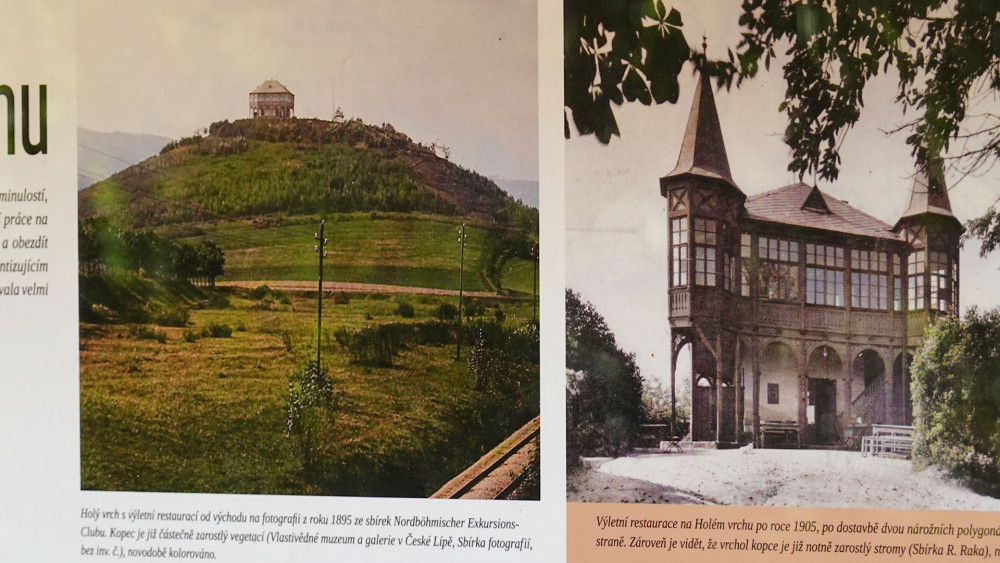 Historii staveb na vrcholu popisují dva velké infopanely. Nejzajímavější jsou dobové obrázky dokládající, že Holý vrch býval opravdu holý.