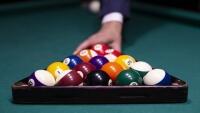close-up-guy-arranging-pool-balls